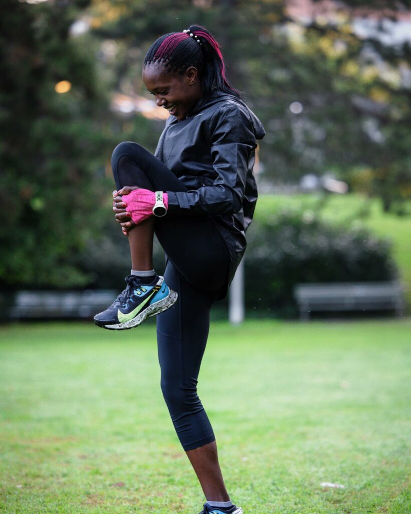 Faith Kipyegon stretching