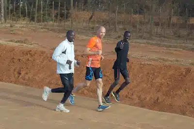 Runners training in Kenya. Ezekiel Kemboi in black.